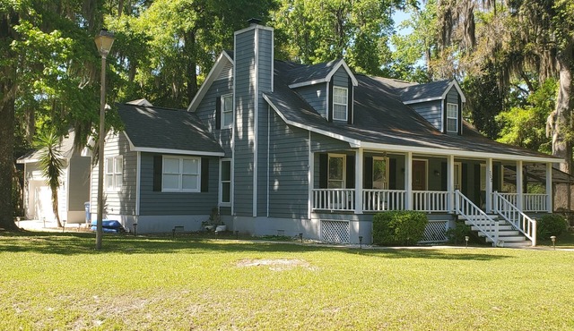 Large custom home with pool centrally located to beaches, parks, and family fun.