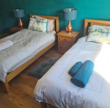 Large ensuite twin room at Fir Tree Lodge