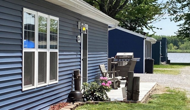 Large family cottage steps from waters edge.