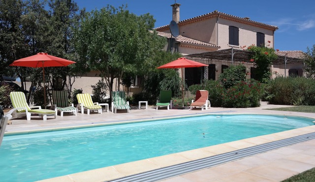 Large family friendly home with pool & beautiful garden, close to beach & shops.