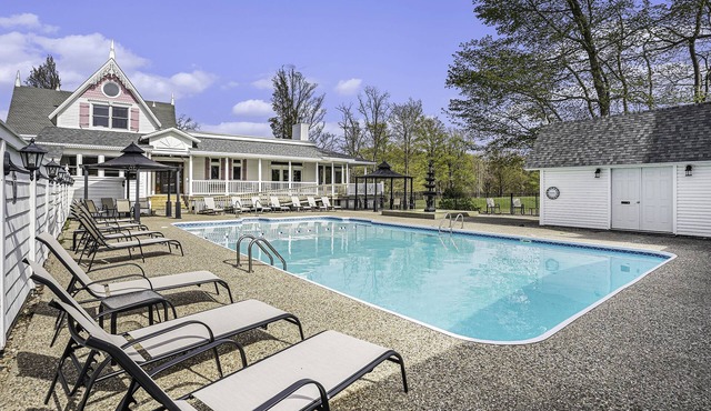 Large family friendly compound, heated pool, and Indoor Basketball court