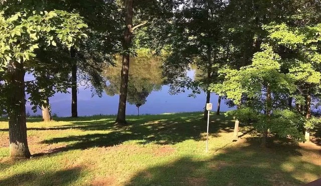 Large family home at LAKE BARKLEY sits on a 2.3 acre lot!