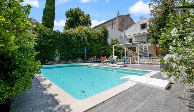 Large family villa with shaded terraces, garden and swimming pool.