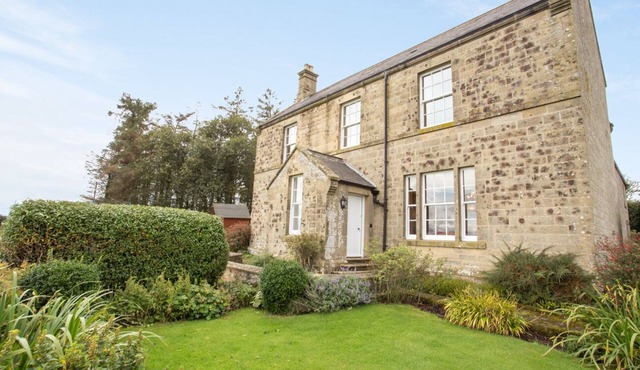 Large farmhouse with valley views in rural setting