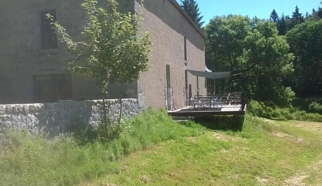 Large independent house overlooking a meadow and stream
