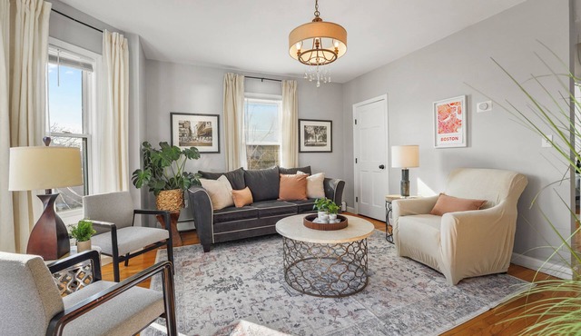 Large group 8-bedroom house in charming Boston with Backyard