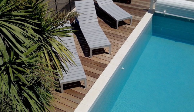 Large holiday home with pool just steps from the beach