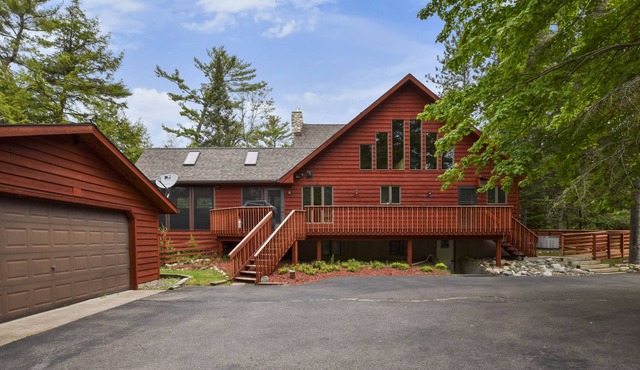 Large home Big Sant Germain Lake sleeps 13 breathtaking views of the sunset.