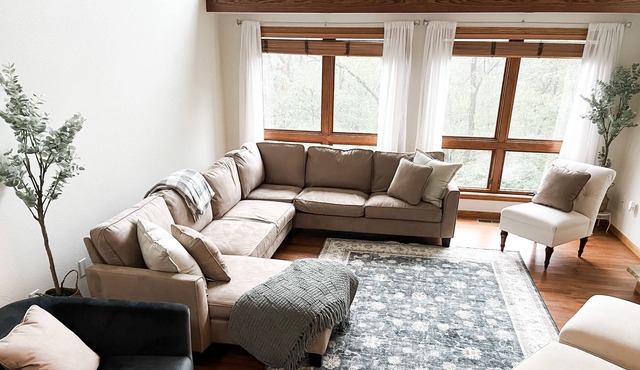 Large home in quiet wooded area with hot tub, billiards, decks & fire pits