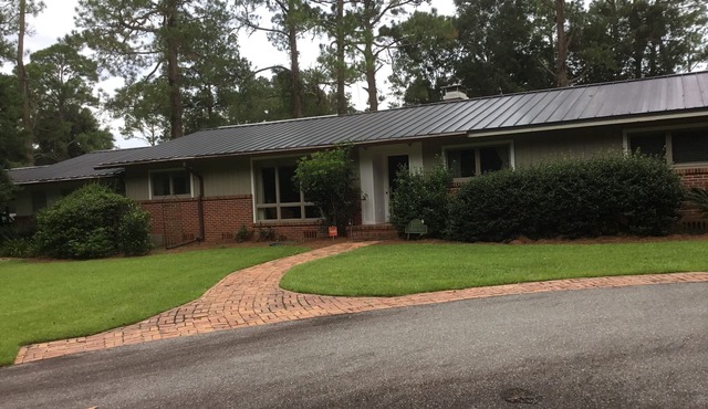 Large home on acreage conveniently located