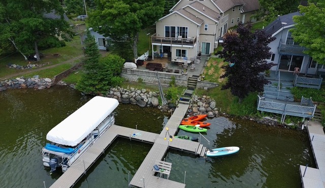 Large home on the UP's best lake! Sleeps 22! Boat to Young's Golf Course!