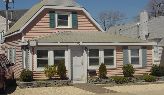 Large home two floors with upper deck area.