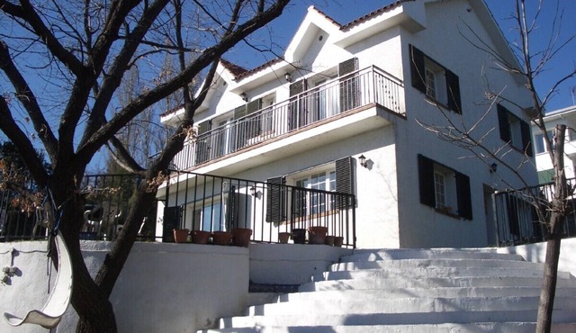 Large house with garden and pool near Madrid. 10 minute walk to village centre.