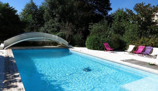 Large house sleeps 14-15 beautiful surroundings, swimming pool, fishing,promenad