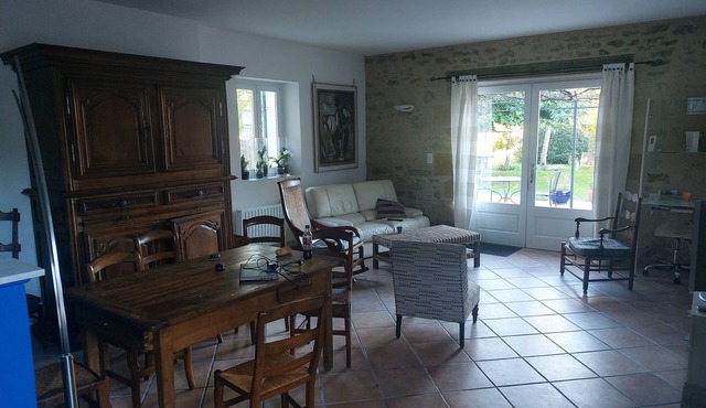 Large house in a village on the edge of a forest