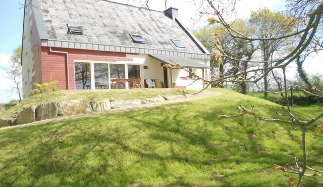 Large house in greenery near the sea