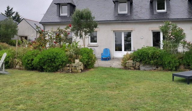 Large house surrounded by nature close to the ocean