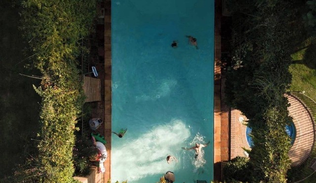 Large house with swimming pool and garden in the heart of orchards.
