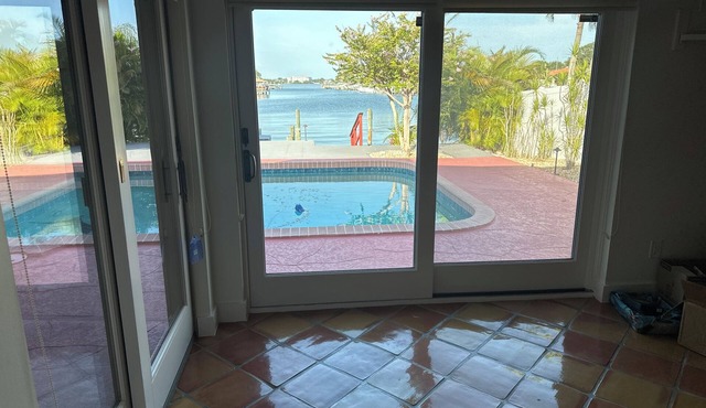 Large House with nice boat dock plus walk/ride a bike to Clearwater Beach