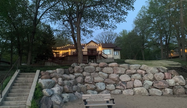 Large Lake House on 2.5 acres with 150 feet of shore front.