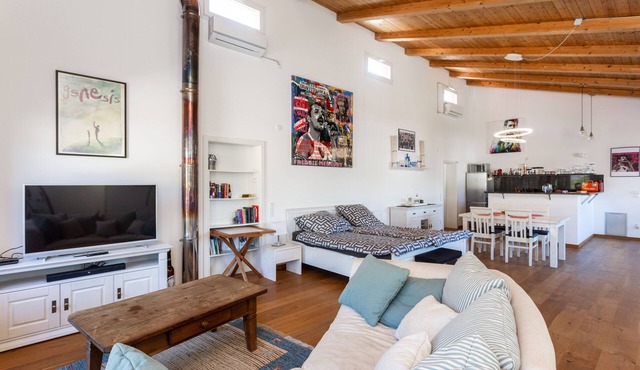 Large loft apartment in a quiet area only 8 minutes to the beach promenade