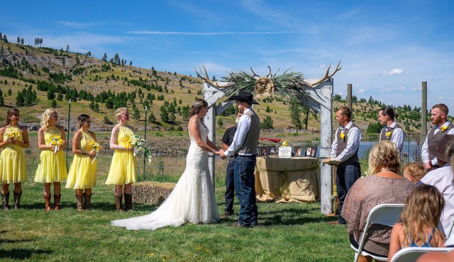 Large log building in the country near a creek