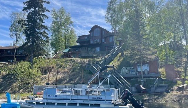Large luxurious lakefront home with water toys & mountain view