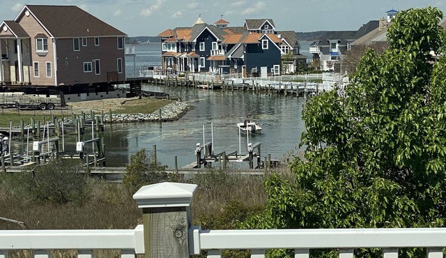 Large Luxury home at 120th; Bayfront Views, private pools, walk to Beach