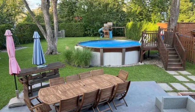 Large modern house with open concept, a/c, heated swimming pool, large garden.