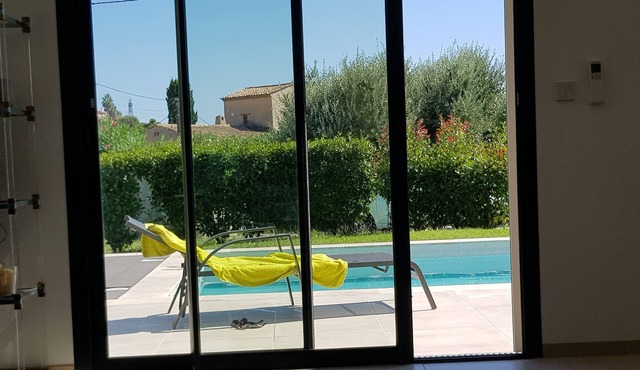 Large modern villa with swimming pool.