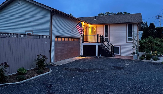 Large Narragansett Ranch that’s been completely renovated as a modern showpiece