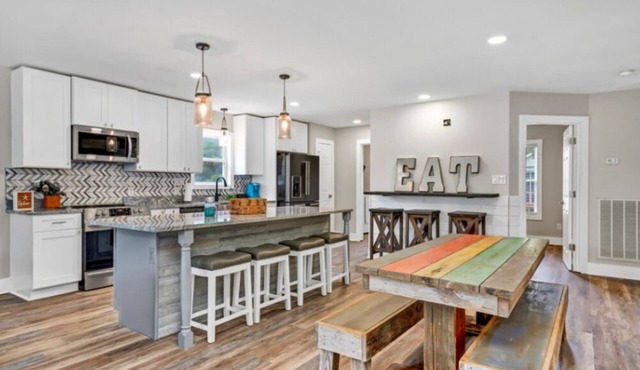 Large newly renovated family home. Sleeps 15. Walking distance to everything.