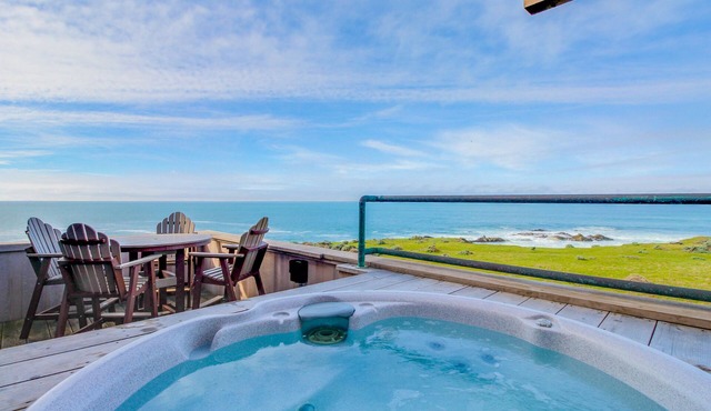 Large oceanfront home with hot tub, shared pool, & large deck - dogs welcome