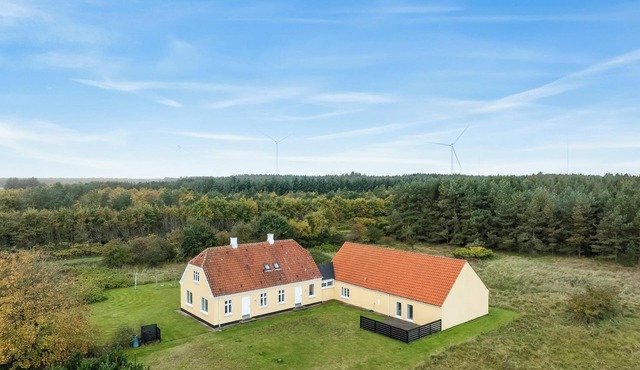 Large pool house with activity room located in peaceful surroundings.