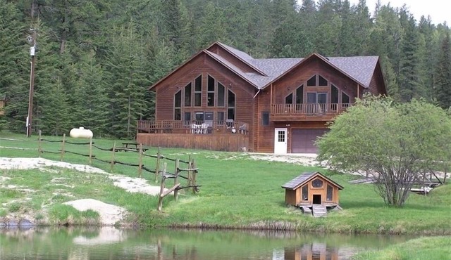 Large private lot. Beautiful cabin with a stream and trout pond!