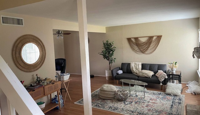 Large room with attached bathroom in the energy corridor area