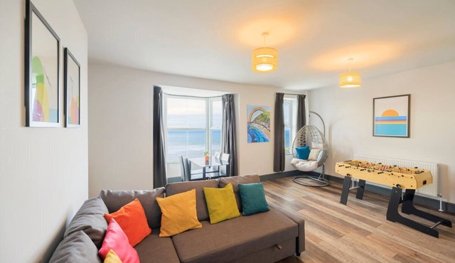 Large seafront apartment with balcony, parking and sea views