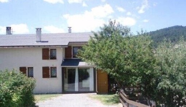 Large self-catered chalet, mature garden, all mod cons, south oriented veranda