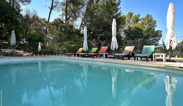 Large studio with terrace and pool view