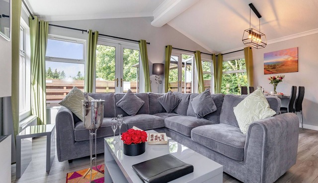 Large superior one-bedroom lodge with hot tub for two adults.