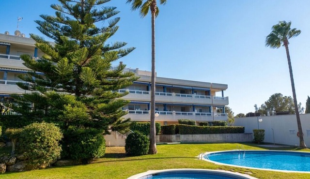 Large terrace, with garden. Pool and near the beach