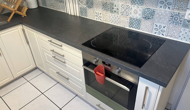 Large two-bedroom apartment with three double beds and secure parking.