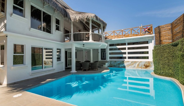 Large villa with private pool walk to the beach and downtown