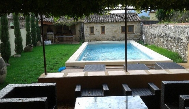 Large village house with swimming pool in the heart of a Provençal village
