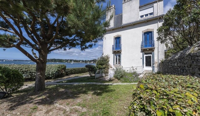 Large waterfront house on a car-free island