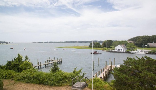 Large waterfront home with deep water dock, you'll Fall in love with Breezy Bluff