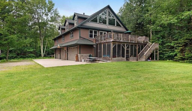 Large, waterfront home w/a full kitchen, dock, canoes, & outdoor firepit