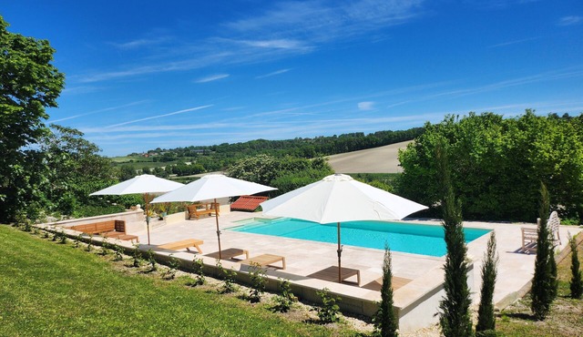 Le Grenier, a charming gîte on the side of a hill. Stunning views, stunning pool