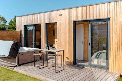 Le Laponya - Chalets climatisés avec SPA & Borne de recharge