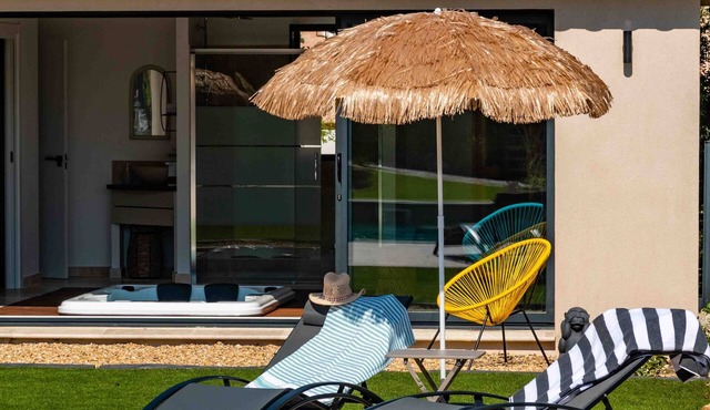 Le Mimosa apartment with private terrace on garden level, a stone's throw from the village.